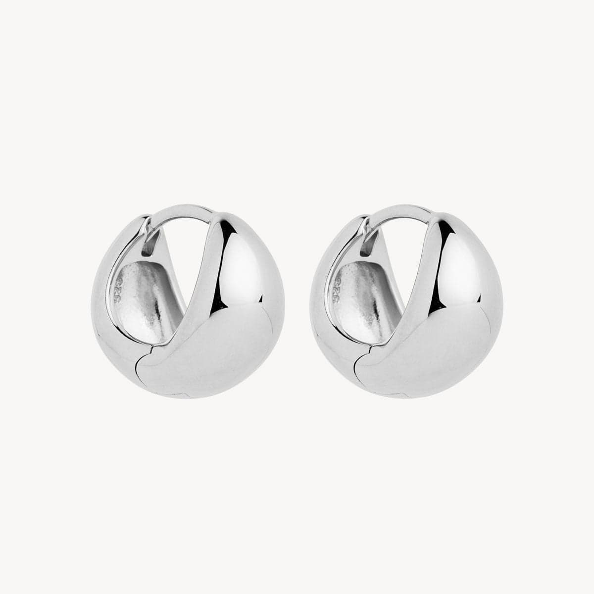 La Muse Huggie Earrings